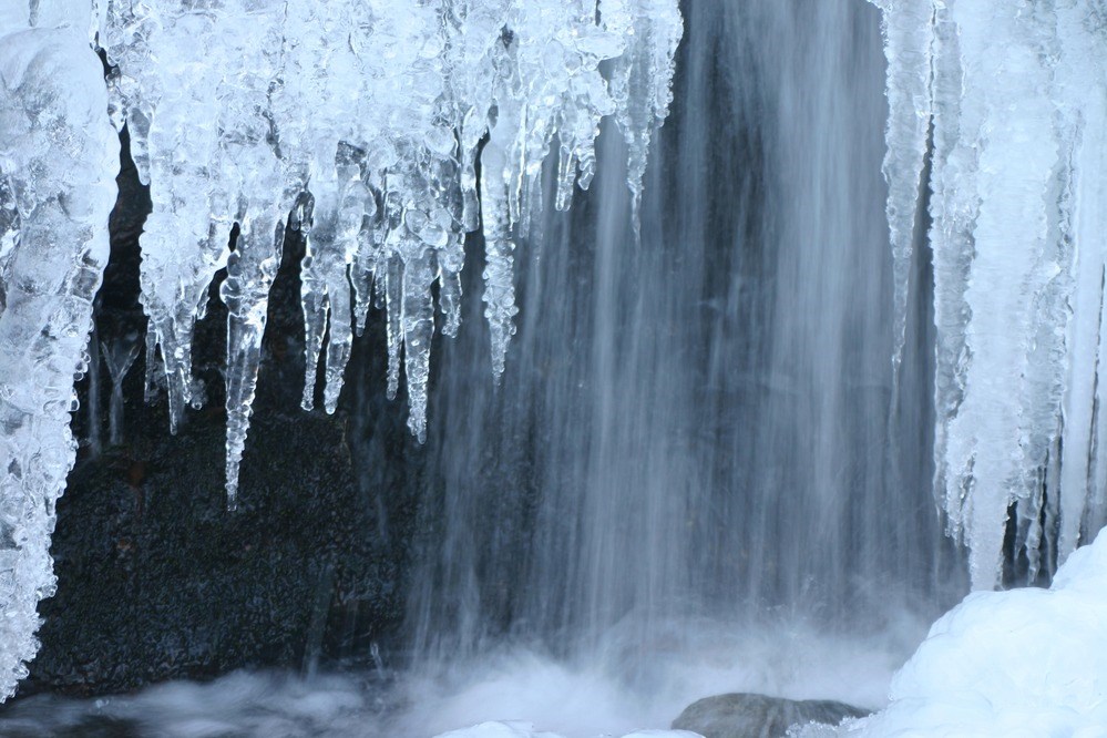 Ice cascades off a waterfall.