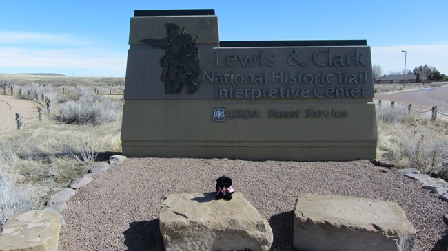 stuffed pup at the Lewis and Clark Interpretive Center Sign