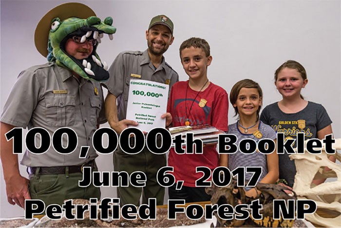 park rangers and kids celebrate 100,000th junior paleontologist booklet