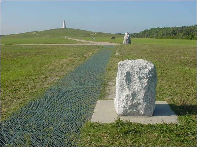 First flight markers made from white stone.