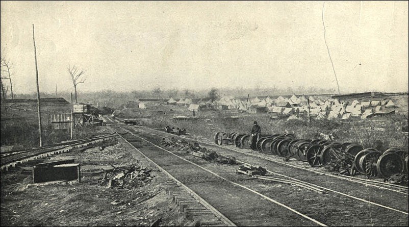 Railroad going through a field.