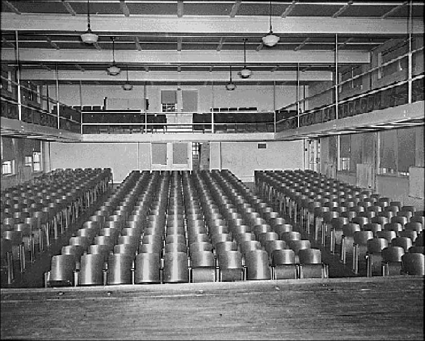 Auditorium with rows of chairs at Farmville High School, Farmville, Virginia. National Archives and Records Administration, Mid Atlantic Region Auditorium with rows of chairs at Farmville High School, Farmville, Virginia. National Archives and Records Administration, Mid Atlantic Region