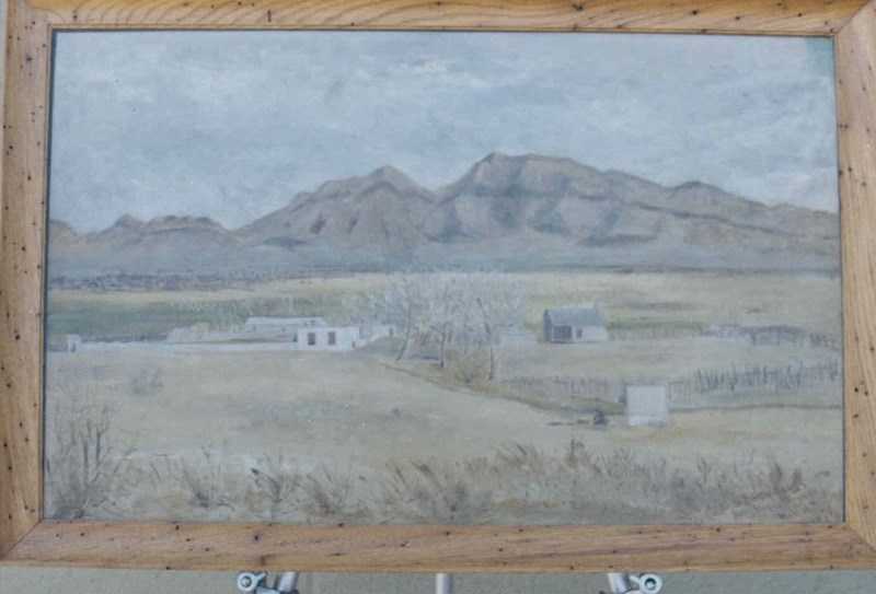 Painting of a western landscape.