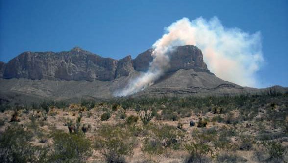 El Capitan fire Smoke rises from a butte