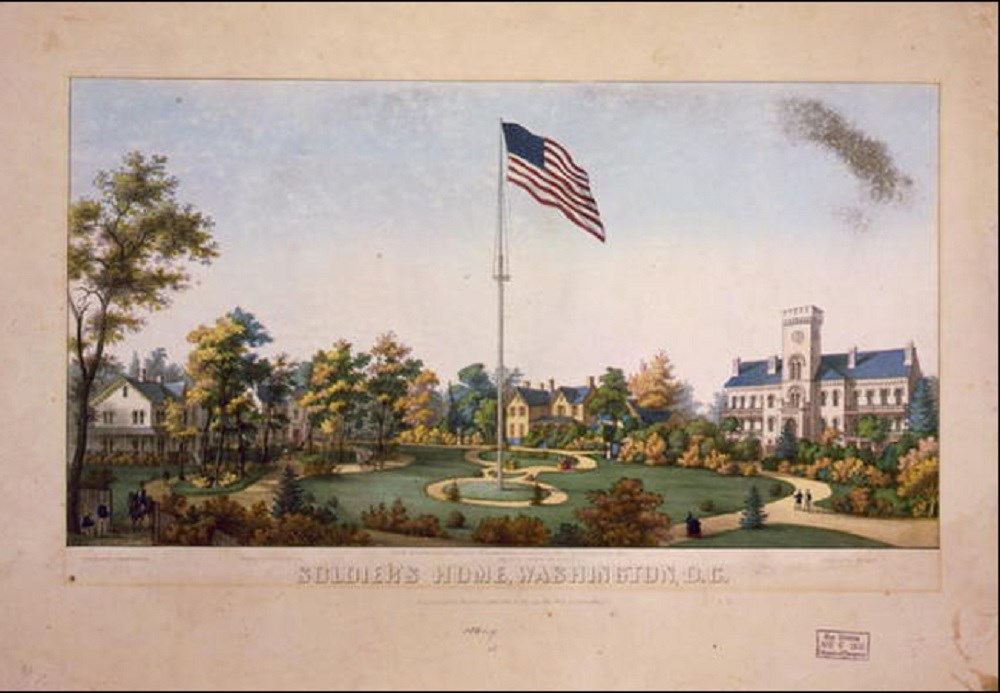 Photo of a open green spaces with a flag pole and American flag.