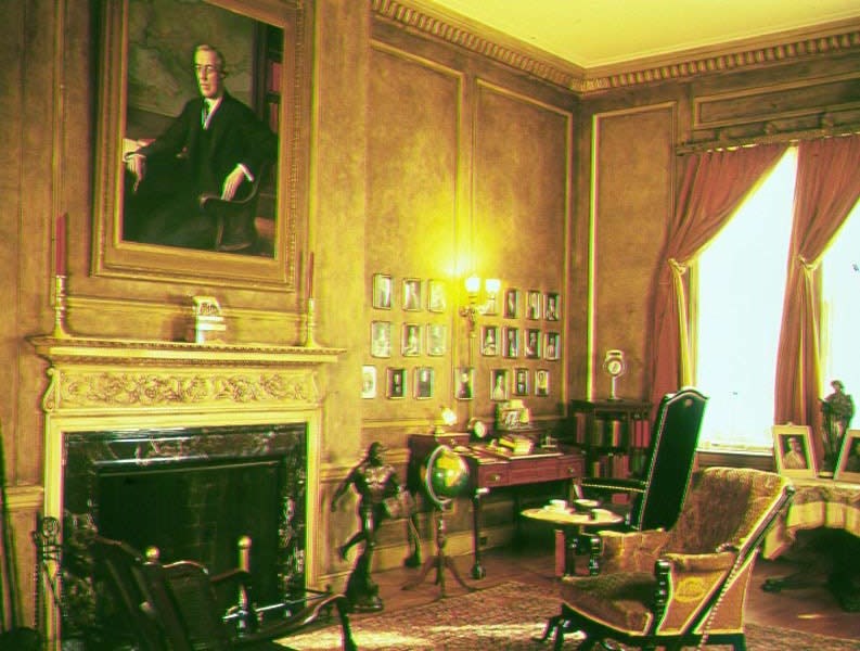 Image of Wilson's library with fireplace and chairs. Image of Wilson's library with fireplace and chairs.