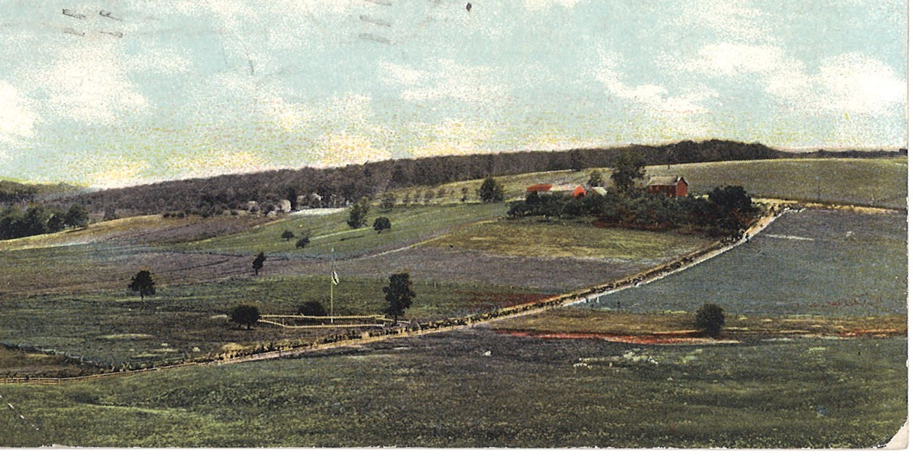 The remnants of Fort Necessity in the distance