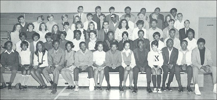 A large group of high school students. Some of them are black and some of them are white.