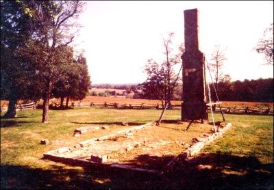 Photograph of the Robinson House site in 1995 prior to the removal of the chimney. All that remains standing is the chimney. Photograph of the Robinson House site in 1995 prior to the removal of the chimney. All that remains standing is the chimney.