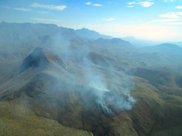 aerial view of smoke in the mountains