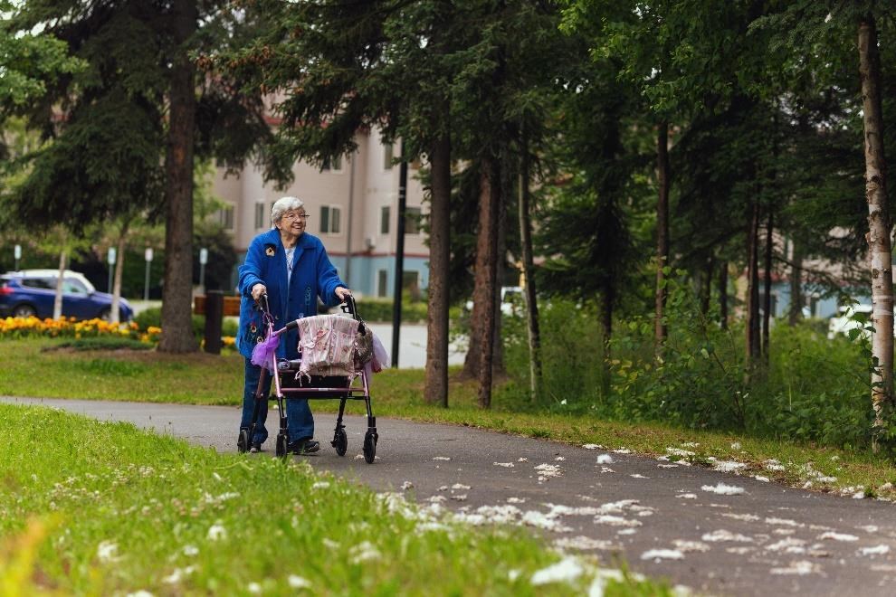 A woman enjoys a leisurely stroll on one of Anchorage’s fully accessible trails. Outdoor recreation is important for maintaining physical, mental and social health. Photo courtesy of Anchorage Park Foundation.