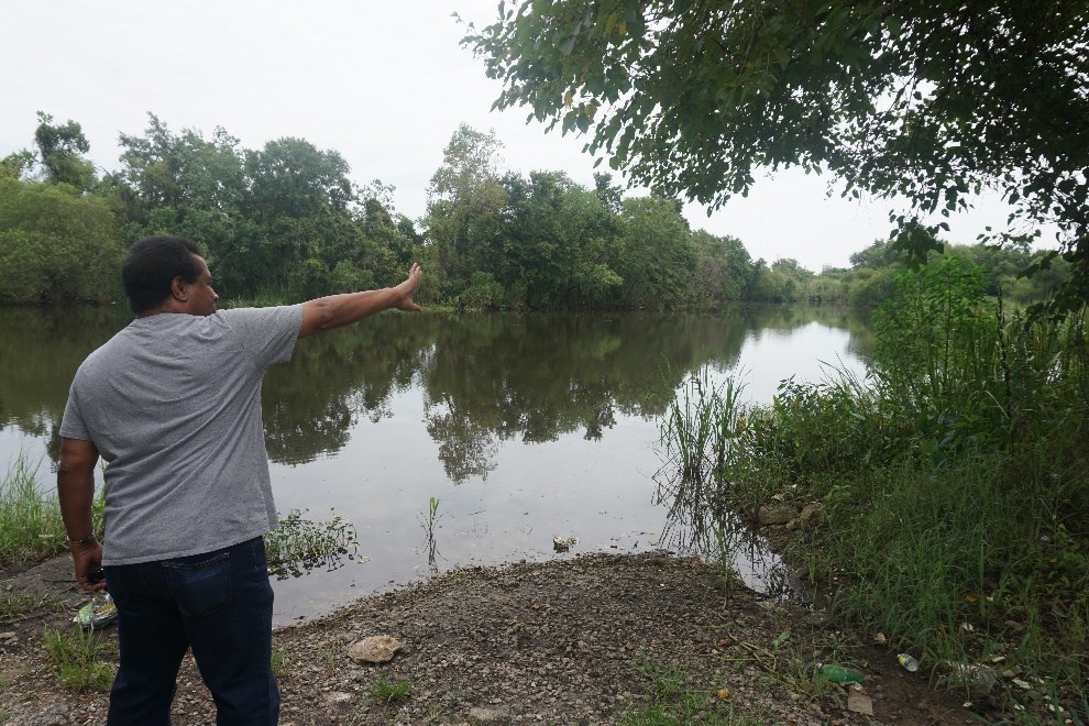 Womack shows where he hopes to see a boat launch by a popular fishing spot along the Chickasaw Creek. Photo by Margaret Gach, National Park Service.