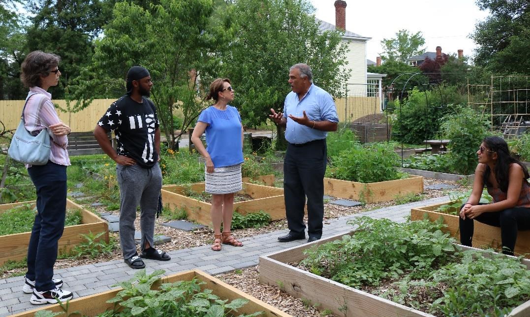 Rob Jones, the executive director of Groundwork Richmond, Virginia explains the role of the Trust in the McDonough Community Garden. Photo courtesy of Evelyn Moreno, National Park Service.