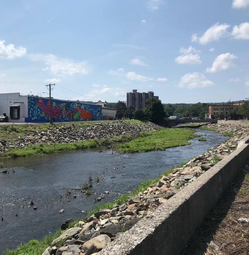 The Naugatuck River flows through Torrington, the northernmost city in
the Naugatuck River Valley. The Naugatuck River flows through Torrington, the northernmost city in the Naugatuck River Valley. Kendra Barat, NPS photo