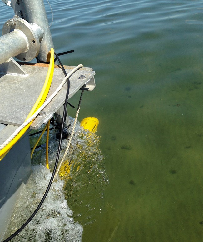 sonar equipment attached to the front of the research vessel