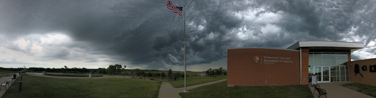 Storm over Heritage Center Dark clouds over the Homestead Heritage Center