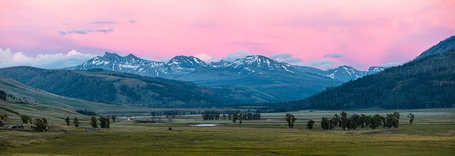 A beautiful Yellowstone sunset highlights the high country.