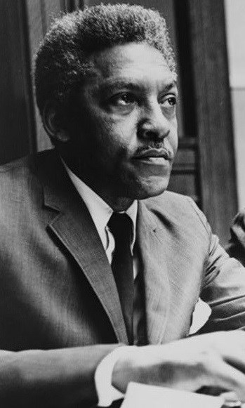 Photo of a man seated. Library of Congress.