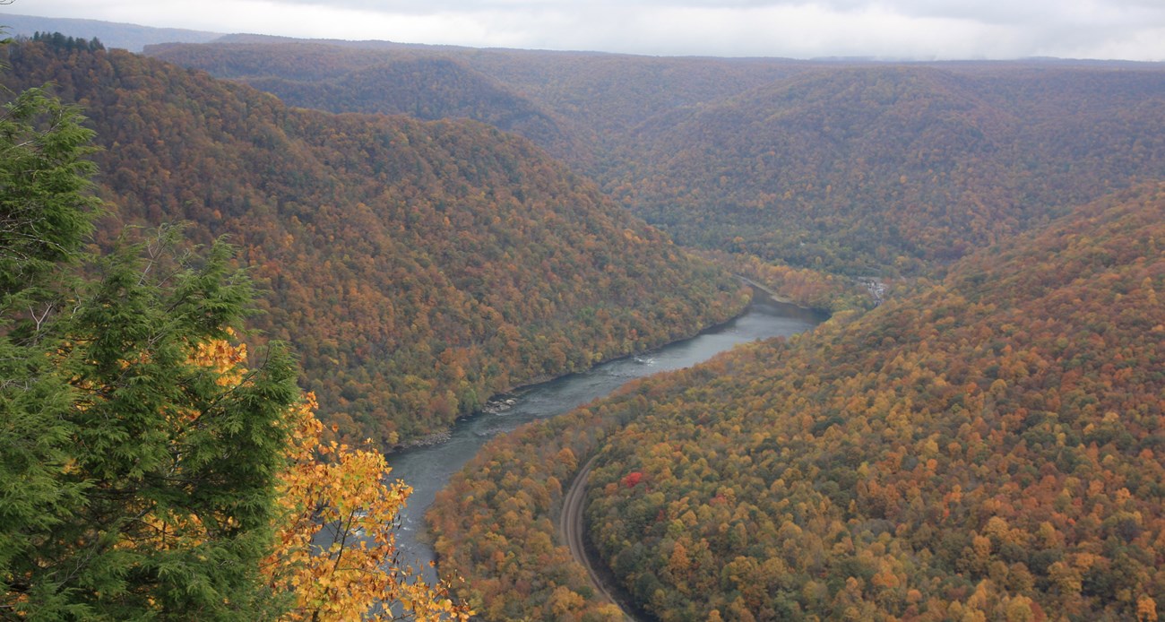 A view of fall foliage and the New River from a high overlook. A view of fall foliage and the New River from a high overlook.