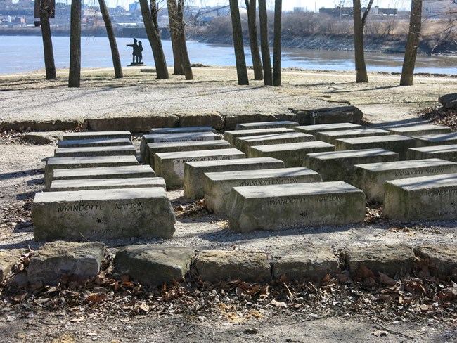 655 stone benches by river