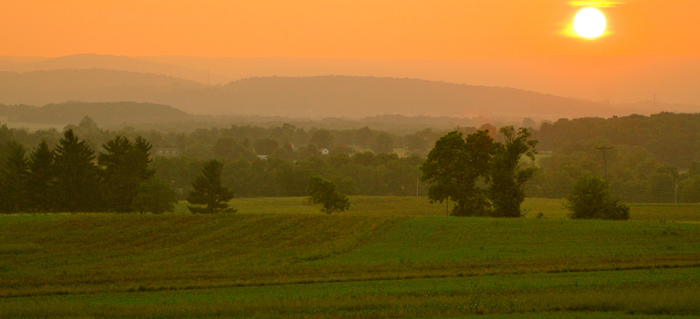 6977834731_702c03470b_o_woody_hibbard_CMS Orange sunset over fields at Gettysburg