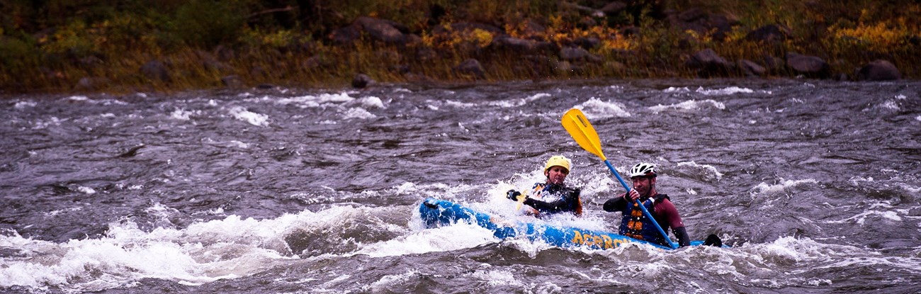 Two kayakers paddling the Gauley River. Two kayakers paddling the Gauley River.