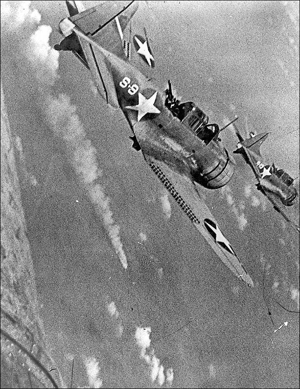 Dive-bombers attacking a Japanese ship, 1942.