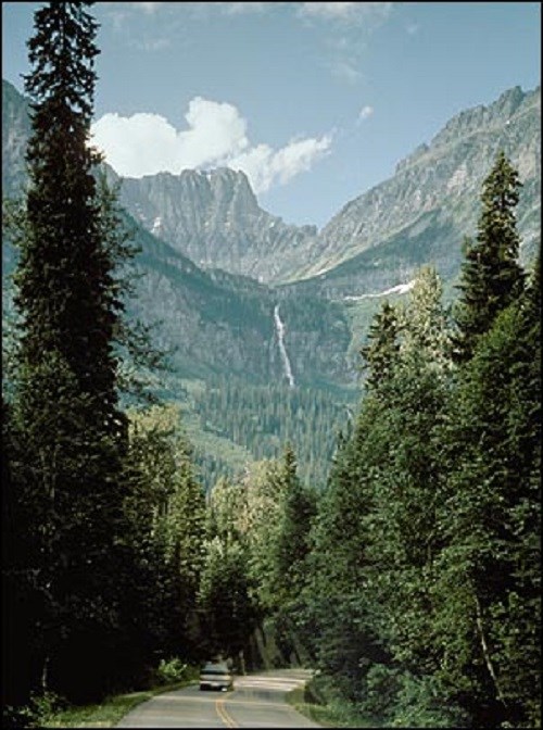 Photo of mountains in backgrounds and pine trees in foreground. (Historic American Engineering Record, Martin Stupich, photographer)