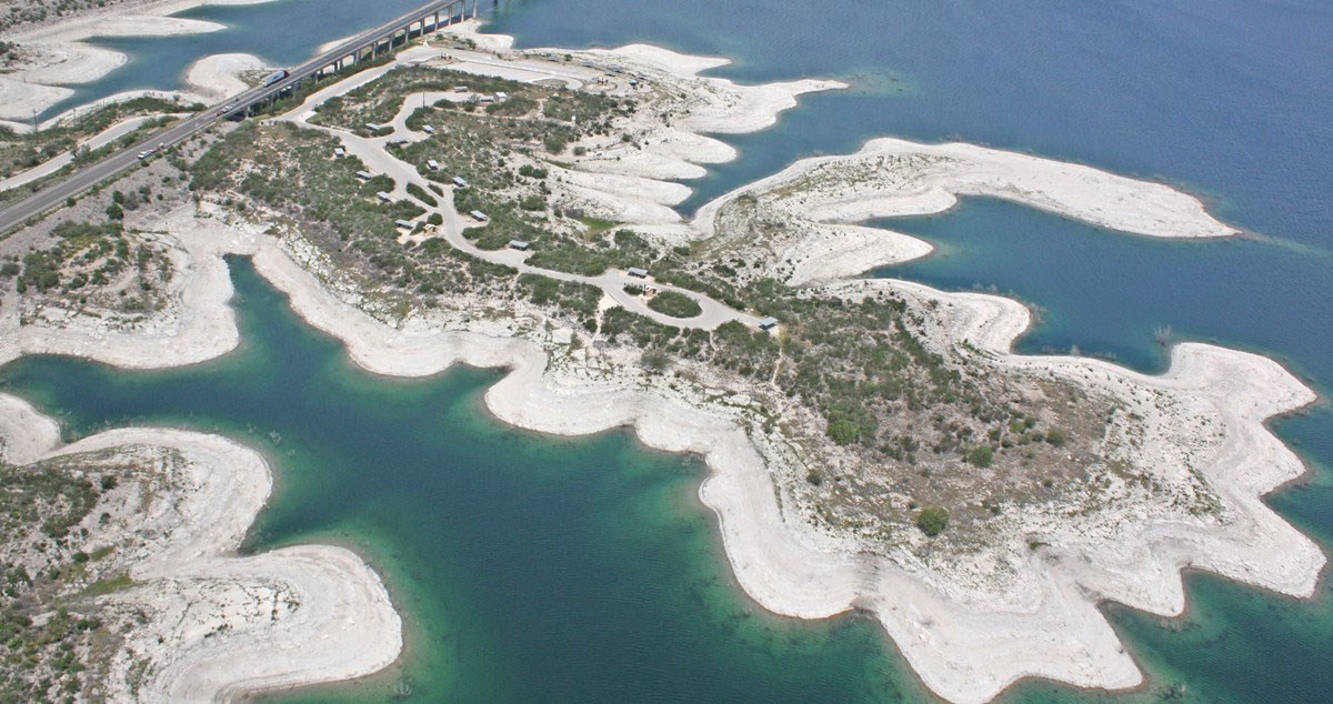 aerial view of low water lake shore
