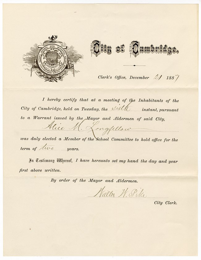 lt= Certificate with seal of City of Cambridge and Alice Longfellow's name handwritten on form