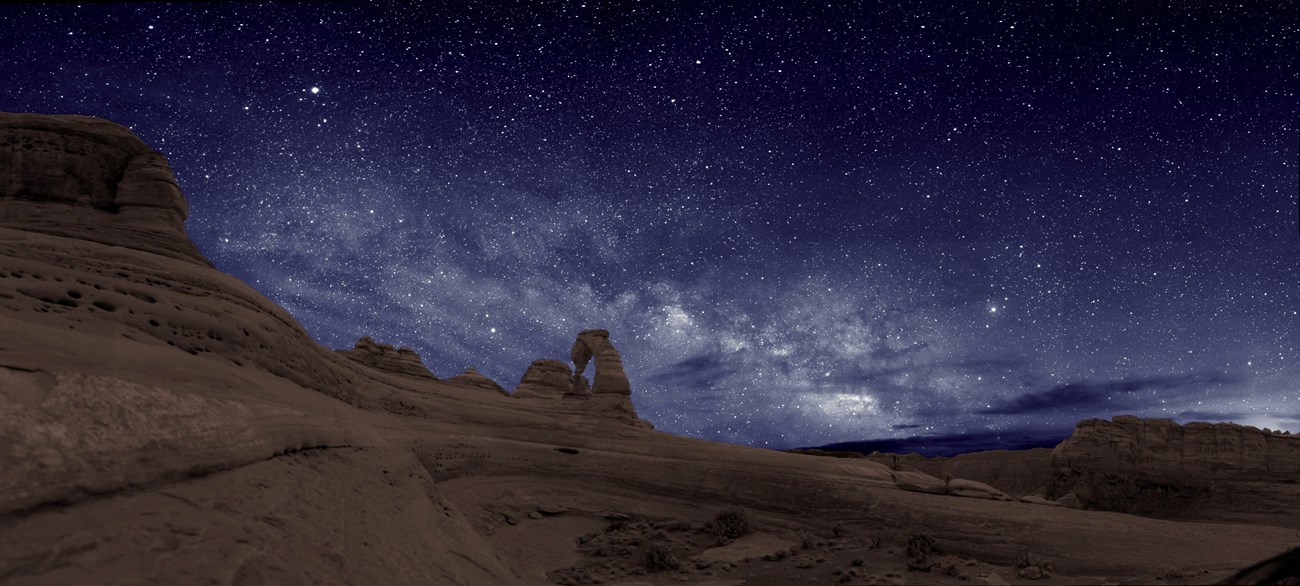 Night sky over Delicate Arch, Arches National Park