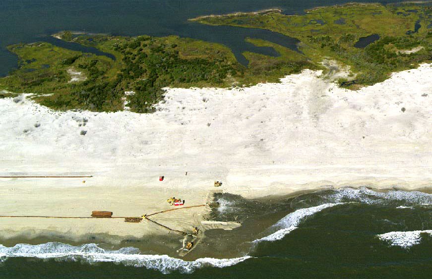sand being added to widen a beach