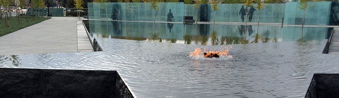 view of flame, fountain, walls, and trees - overview