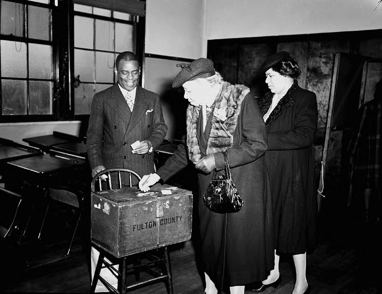 Casting ballots in the race for Fifth District, United States Congress. African American voters were crucial to Helen Douglas Mankin's electoral victory. LBME3-037a, Lane Brothers Commercial Photographers Photographic Collection, 1920-1976. Photographic C