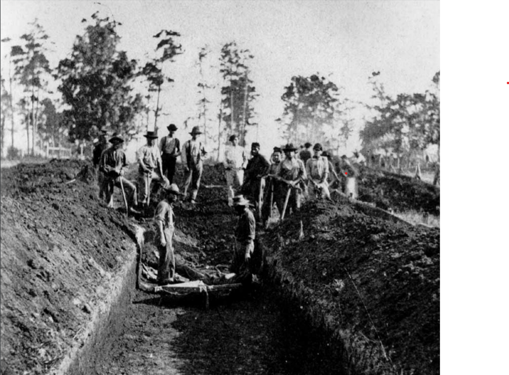 Prisoners burying the deceased in mass graves