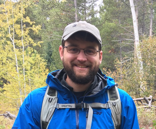 lt= Andrew White enjoys a hike on a rainy day in Grand Teton National Park