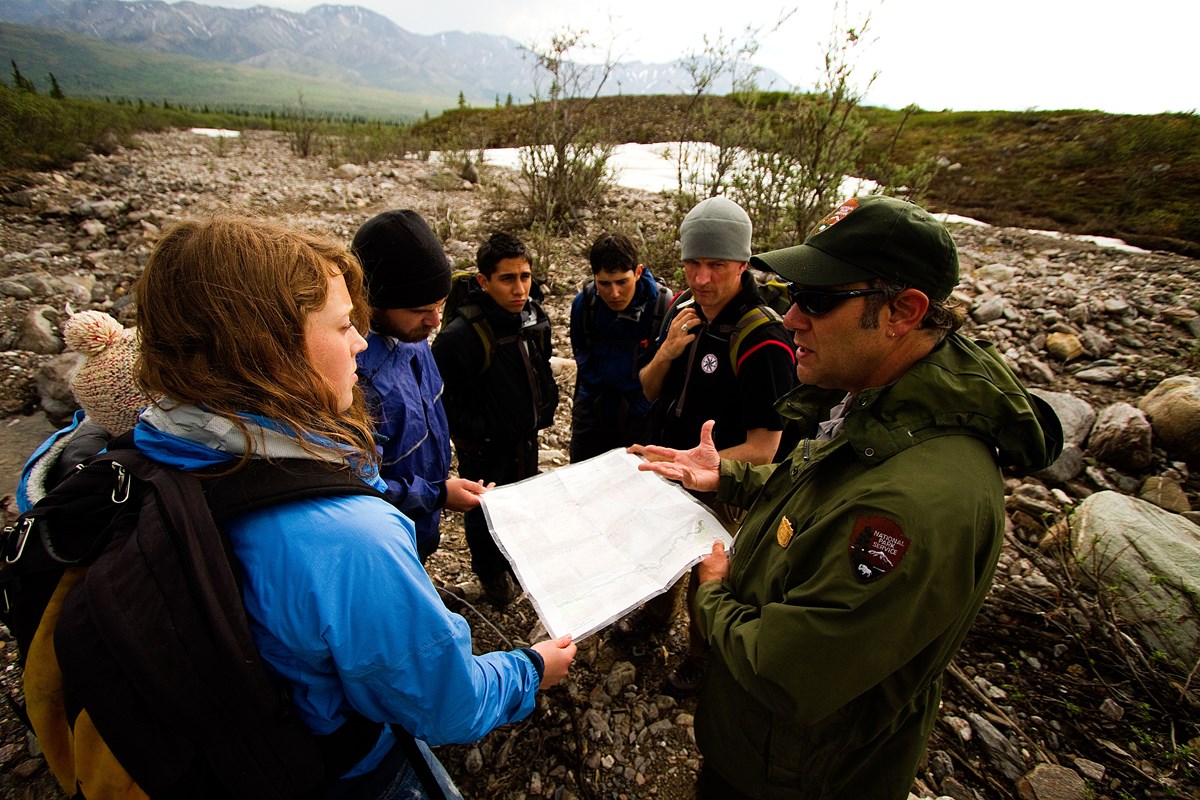 Ranger talking with group of hikers