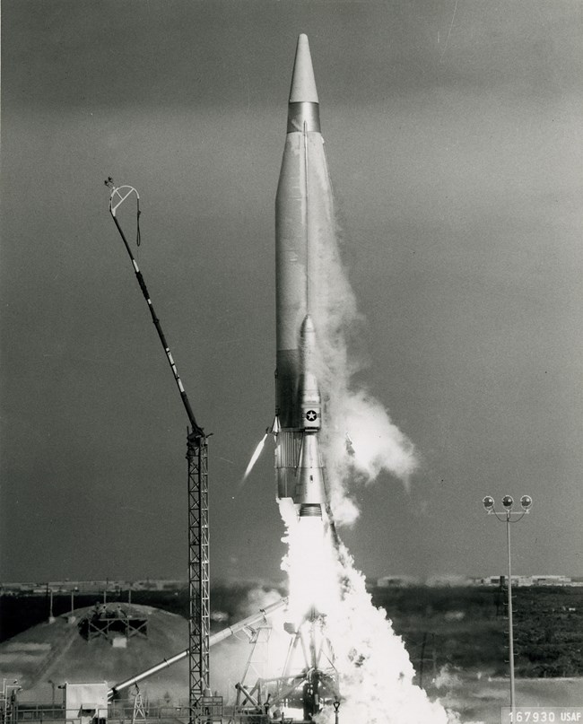Missile lifting off from a test pad