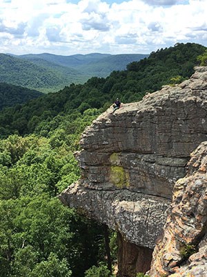 Buffalo National River paleontology intern Aliera Konett at a scenic overlook in the park