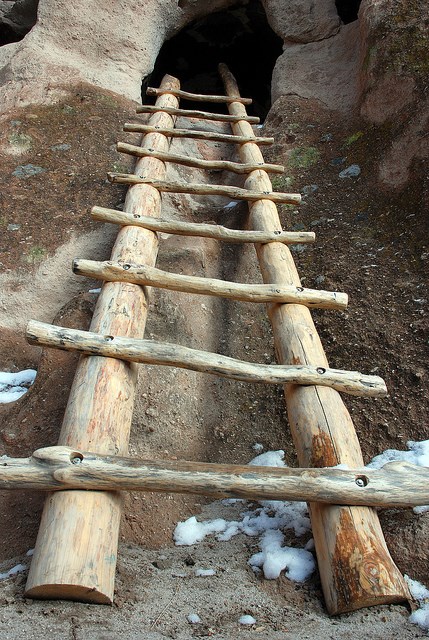 The entrance to a cavate from the outside. Ladders used today in the park are reconstructed using very similar techniques to those the Ancestral Pueblo people used.