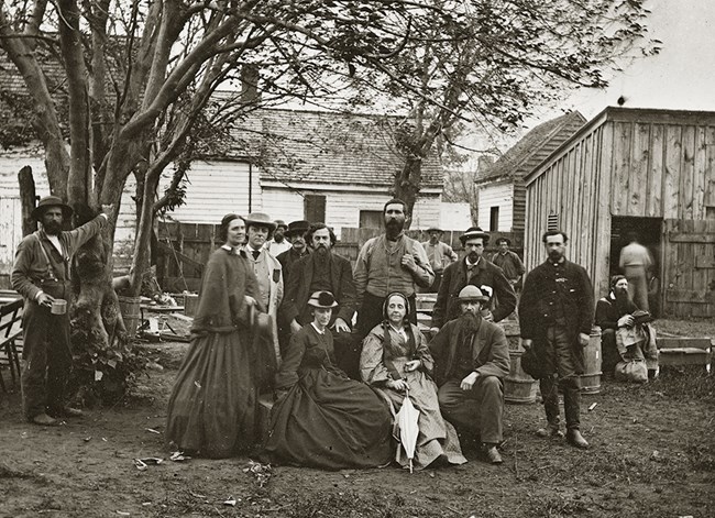 Arabella Barlow- “Woman standing at the far left is Mrs. General Barlow.”