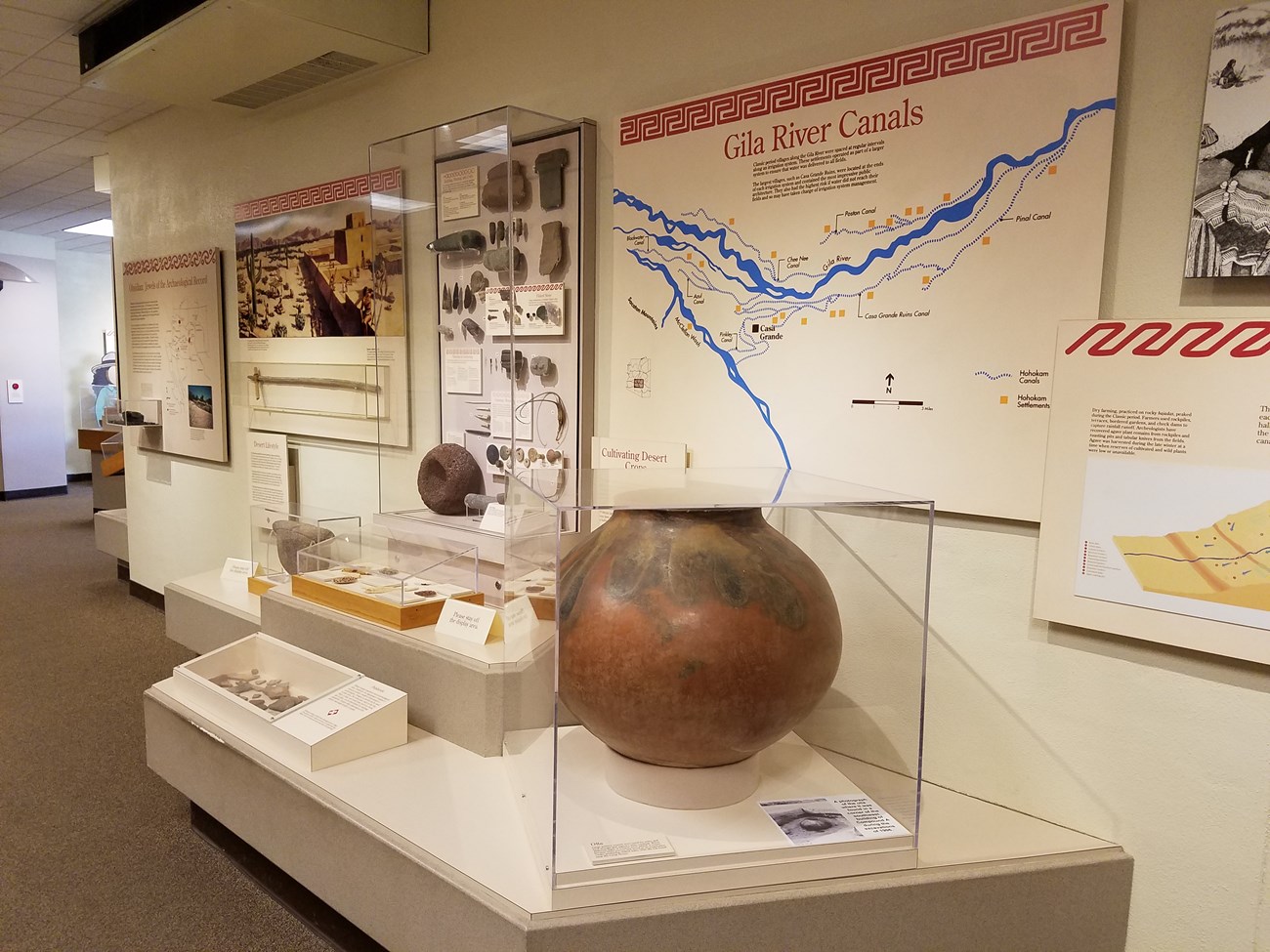 CAGR Museum Museum exhibit with about Gila River Canals with signs and pottery pieces