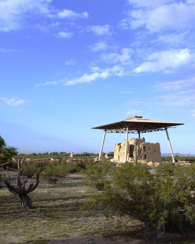 casa grande ruins with protective roof above casa grande ruins with protective roof above