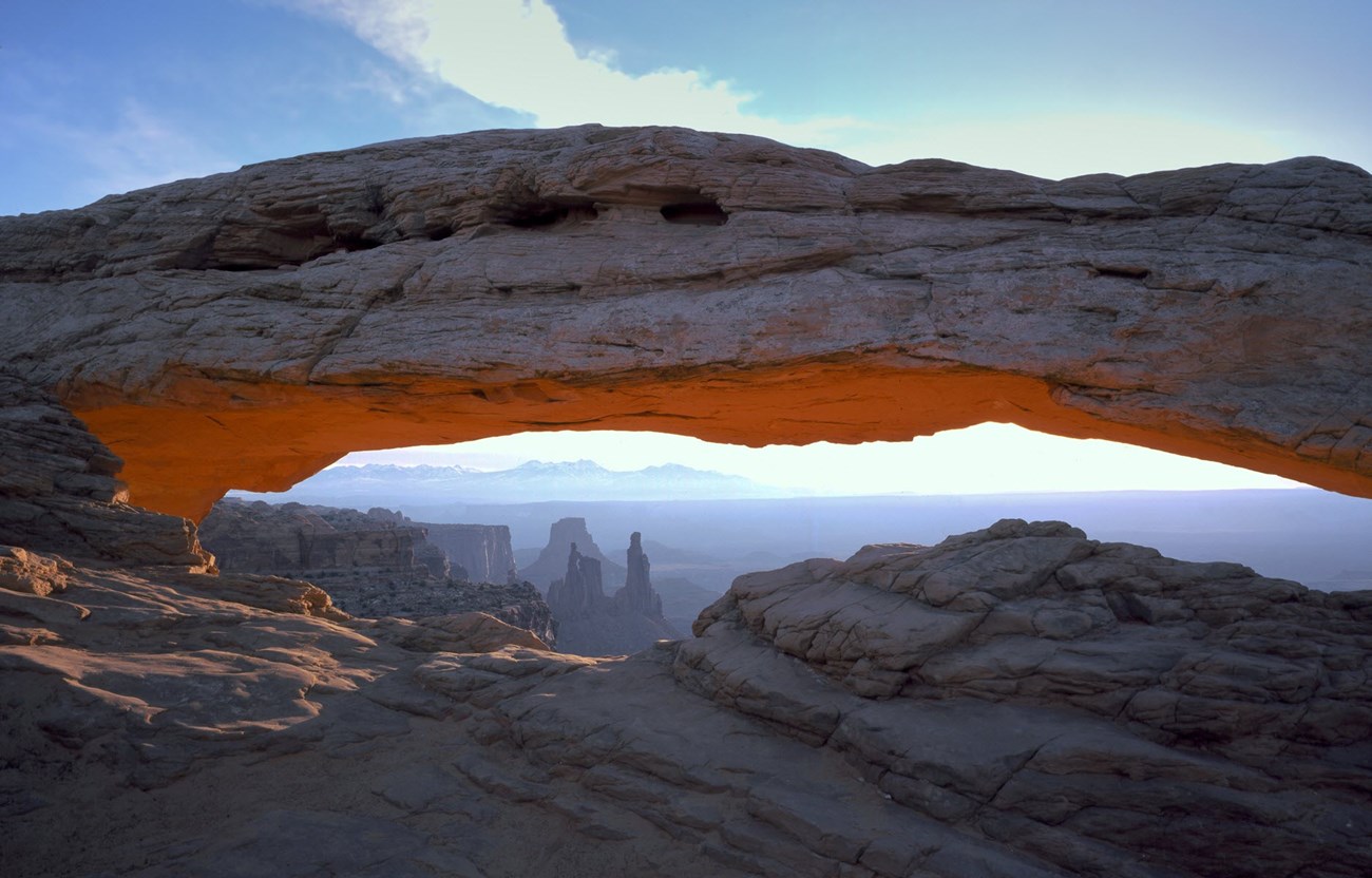 Mesa Arch in Canyonlands NP Canyonlands and the La Sal Mountains seen through a natural arch