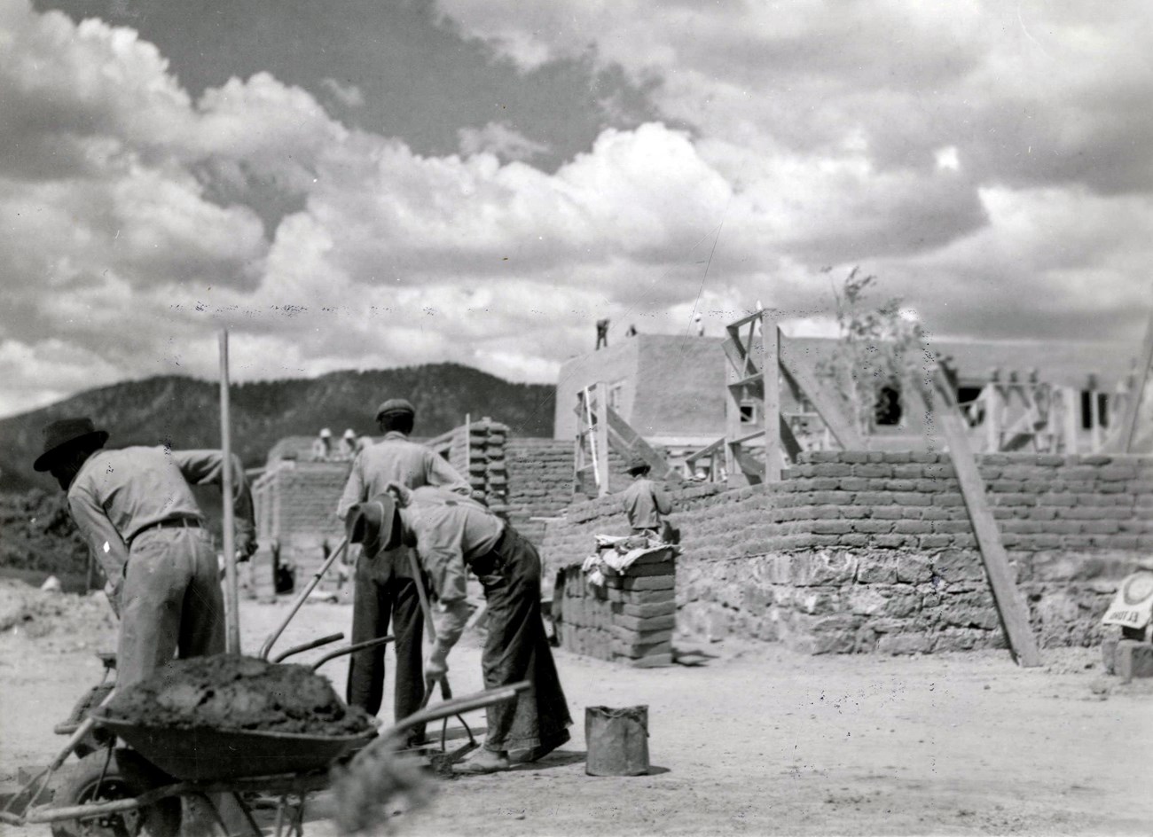 CCC men constructing adobe bricks for building construction