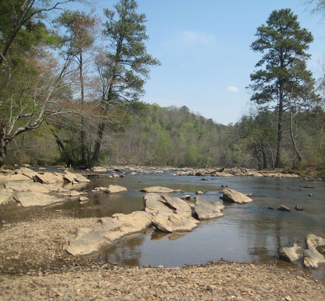 river running through rocky shoals