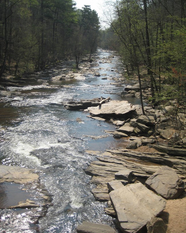 river running through rocky shoals