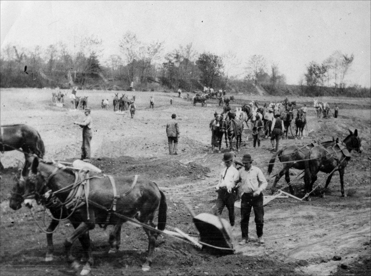 Canal repairs, showing the tools used by the canal builders. Canal repairs, showing the tools used by the canal builders.