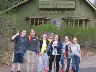 Youths stand in front of a building at a national park Youths stand in front of a building at a national park
