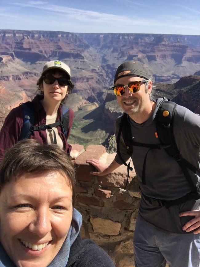 Chris Close hiking with two other people in the Grand Canyon National Park